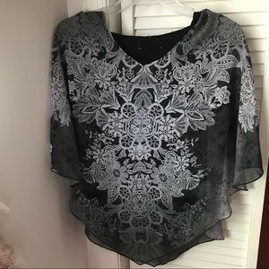 NWT flowy floral design black layered top